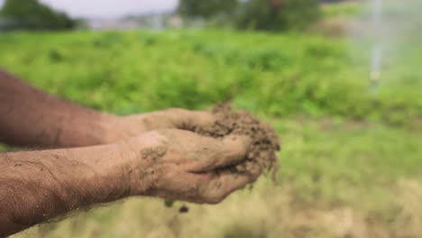Farmer-with-muddy-hands.